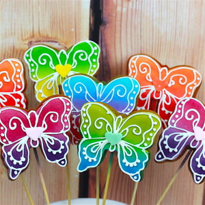 Multicoloured butterfly cookie pops